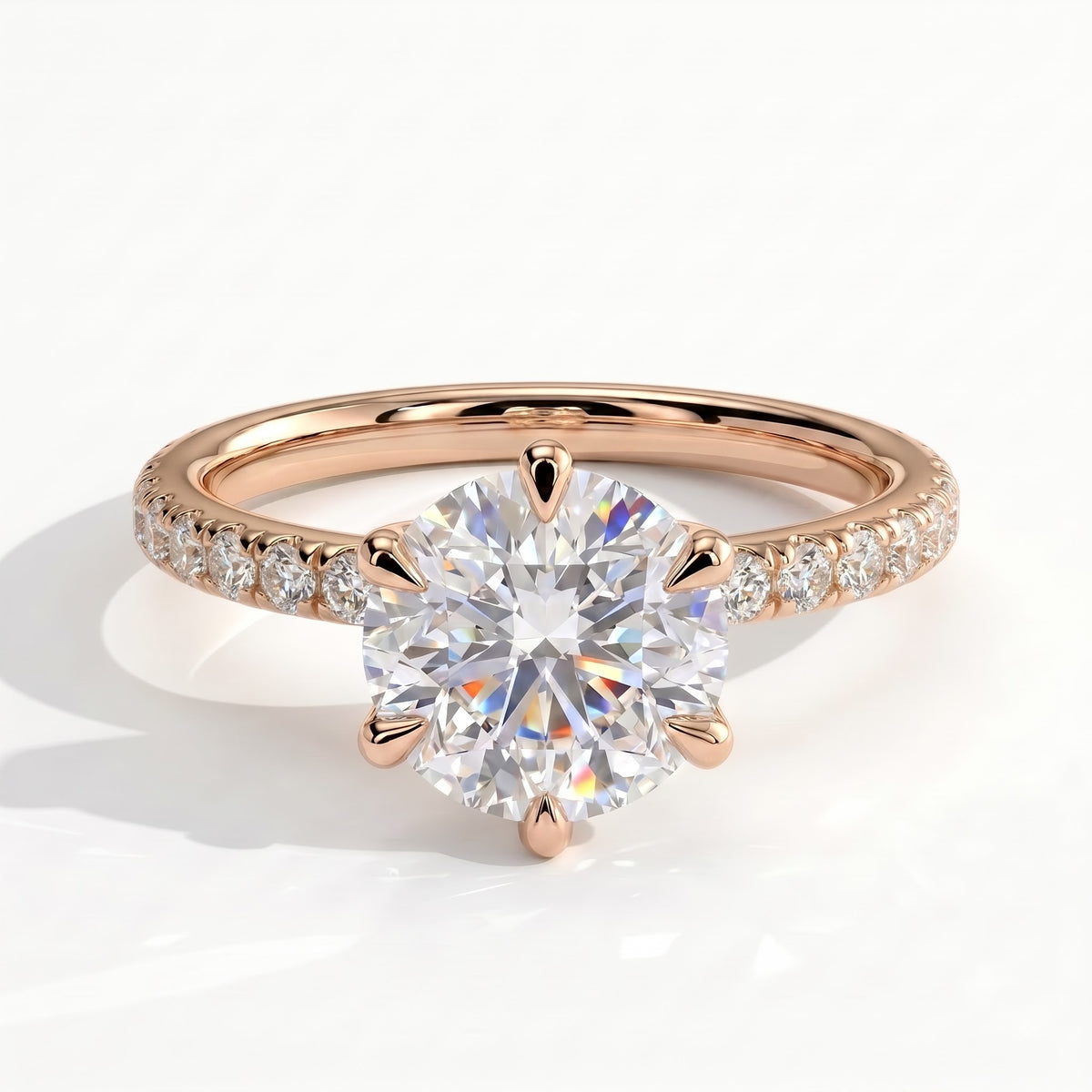 Round lab-grown diamond halo engagement ring in 14K (585) rose gold, front view 