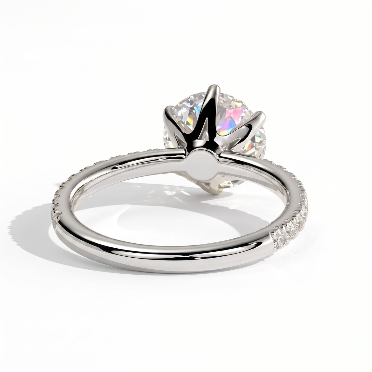 Round lab-grown diamond halo engagement ring in 18K (750) white gold, on white background 