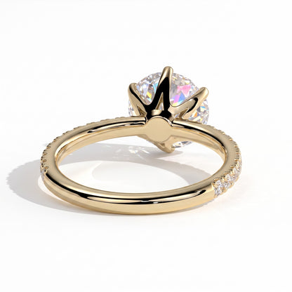 Round lab-grown diamond halo engagement ring in 18K (750) yellow gold, on white background 