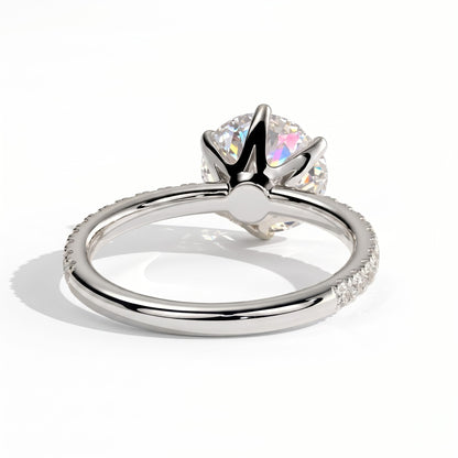 Round lab-grown diamond halo engagement ring in 950 platinum, on white background 