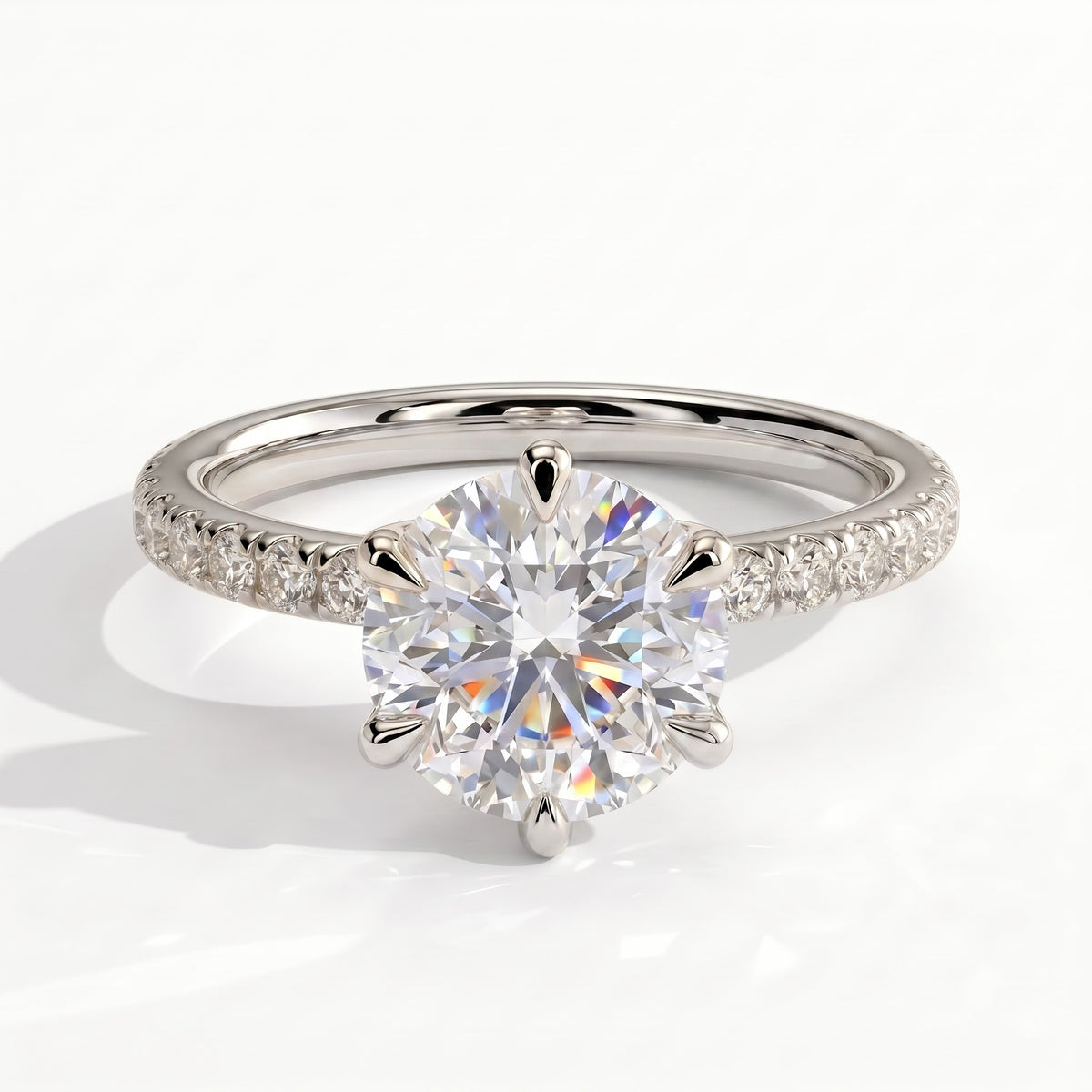 Round lab-grown diamond halo engagement ring in 950 platinum, front view 