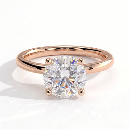 Round lab-grown diamond solitaire engagement ring in 14K (585) rose gold, front view 