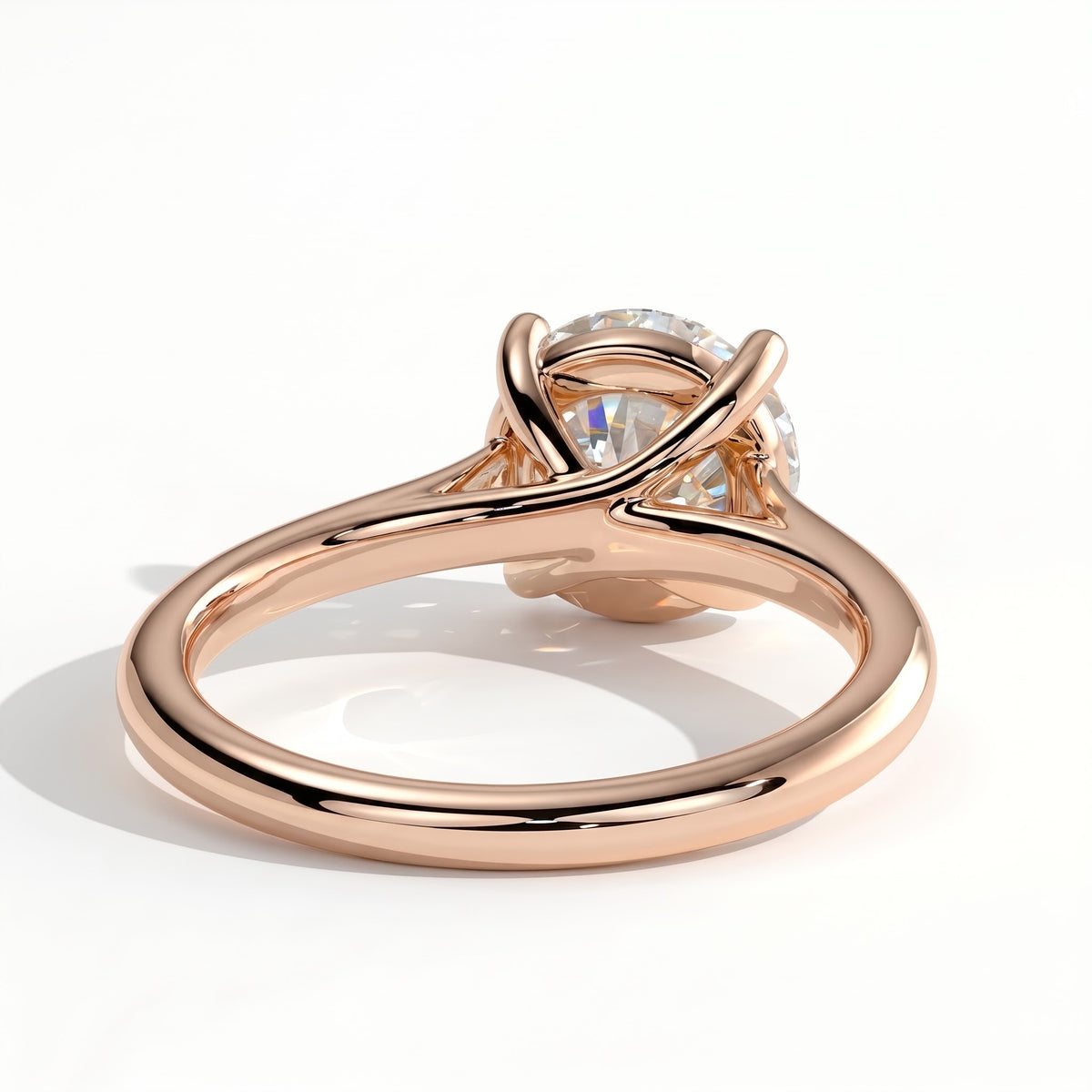 Round lab-grown diamond solitaire engagement ring in 14K (585) rose gold, on white background 