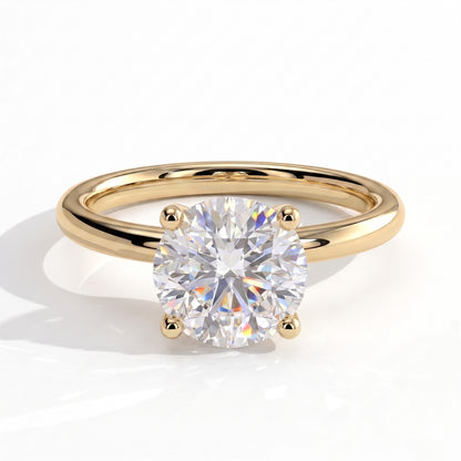 Round lab-grown diamond solitaire engagement ring in 14K (585) yellow gold, front view 