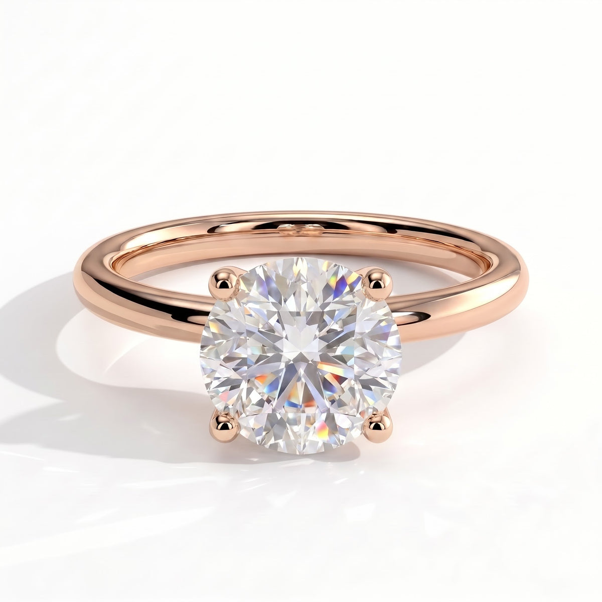 Round lab-grown diamond solitaire engagement ring in 18K (750) rose gold, front view 