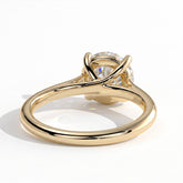 Round lab-grown diamond solitaire engagement ring in 18K (750) yellow gold, on white background 