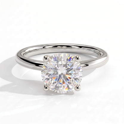 Round lab-grown diamond solitaire engagement ring in 950 platinum, front view 