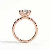 Round lab-grown diamond halo engagement ring in 14K (585) rose gold, side profile 