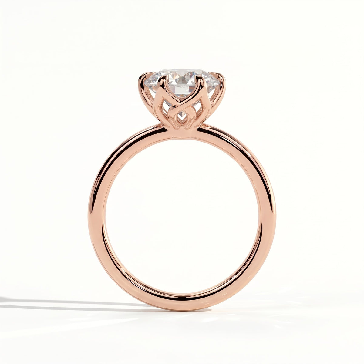 Round lab-grown diamond halo engagement ring in 14K (585) rose gold, side profile 