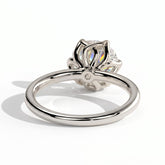 Round lab-grown diamond halo engagement ring in 950 platinum, on white background 