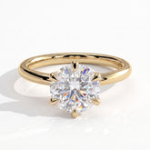 Round lab-grown diamond solitaire engagement ring in 14K (585) yellow gold, front view 
