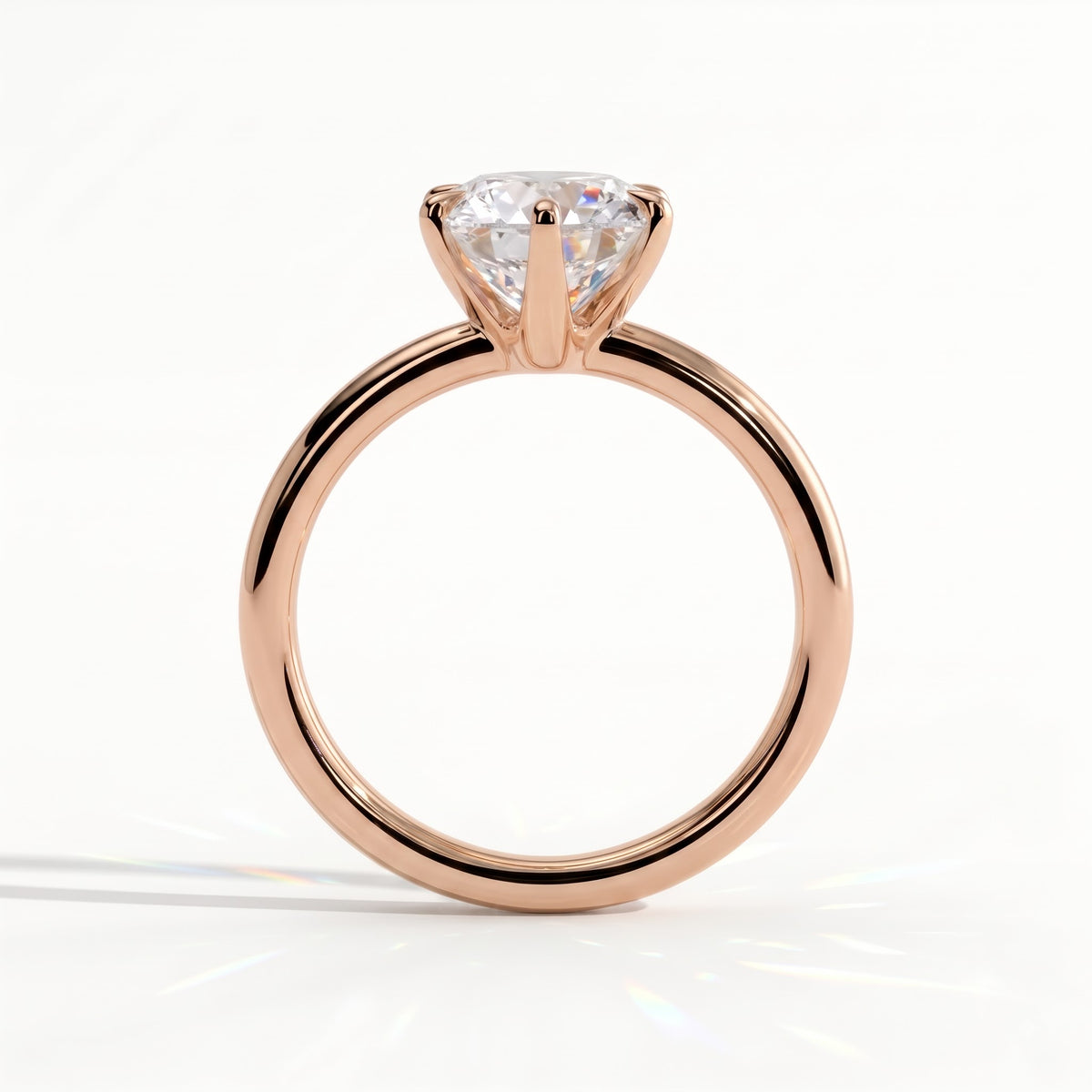 Round lab-grown diamond solitaire engagement ring in 14K (585) rose gold, side profile 