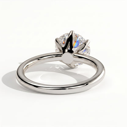 Round lab-grown diamond solitaire engagement ring in 14K (585) white gold, on white background 