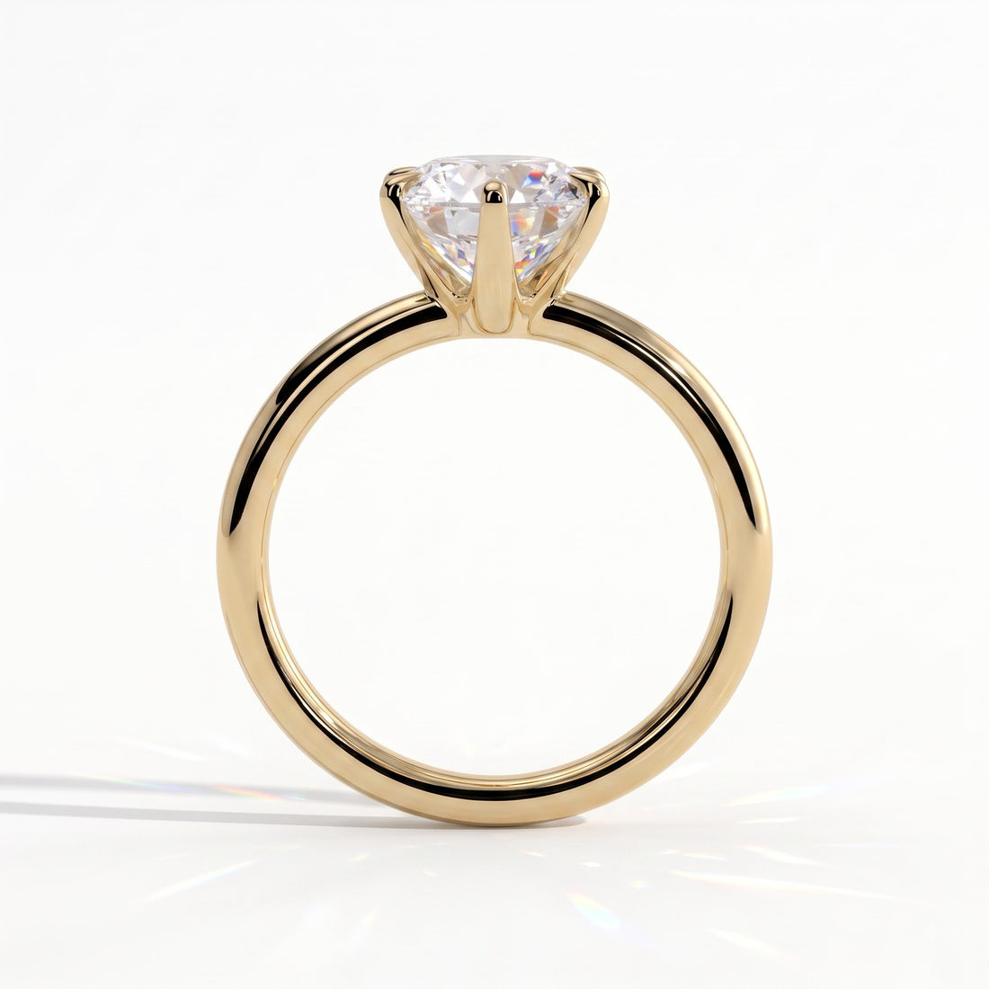 Round lab-grown diamond solitaire engagement ring in 14K (585) yellow gold, side profile 