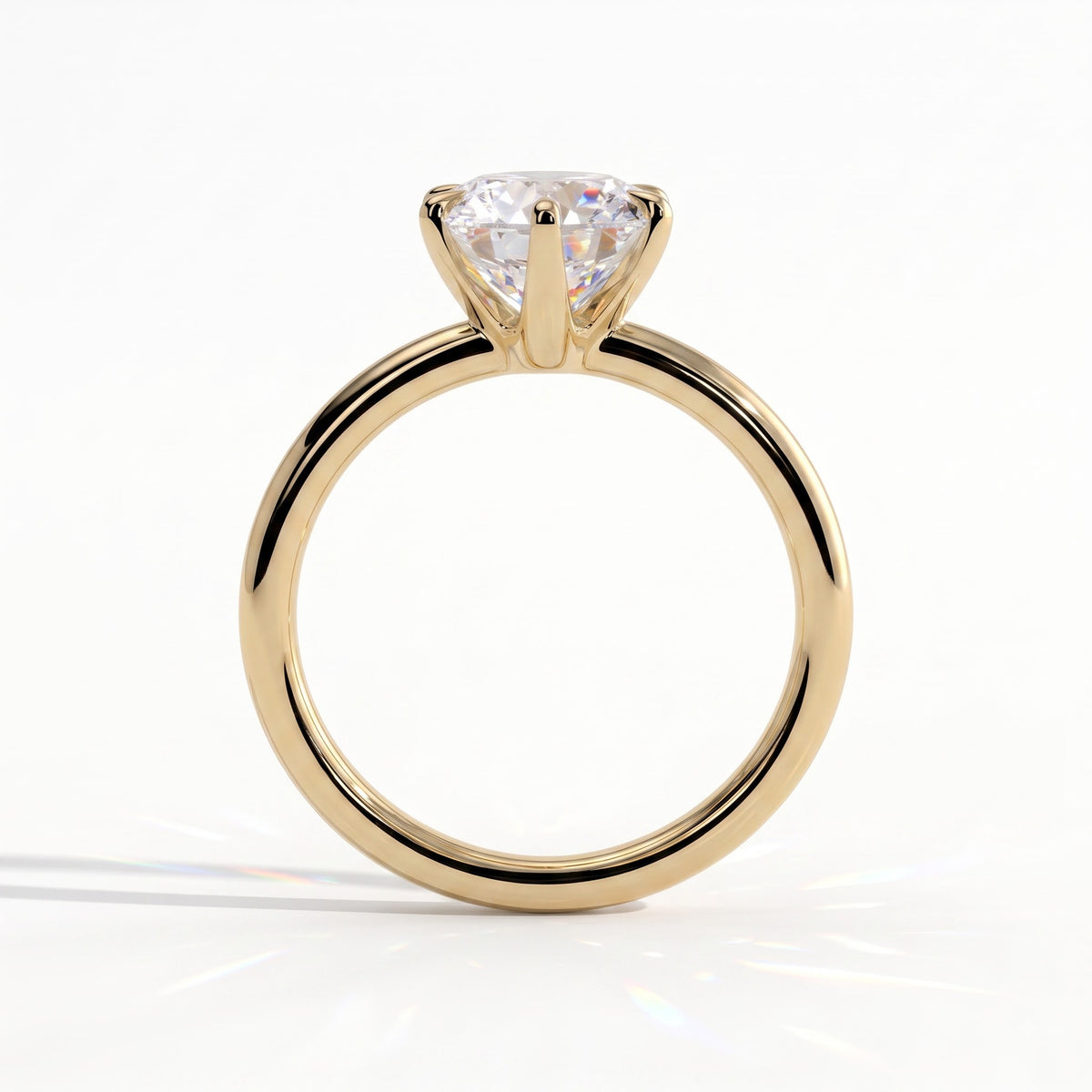 Round lab-grown diamond solitaire engagement ring in 18K (750) yellow gold, side profile 