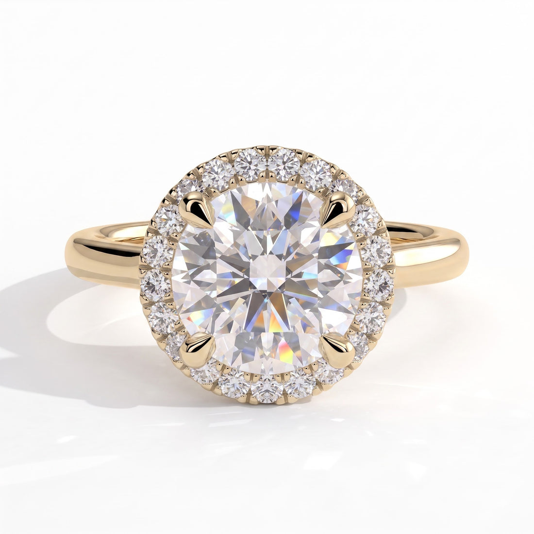 Round lab-grown diamond halo engagement ring in 14K (585) yellow gold, front view 