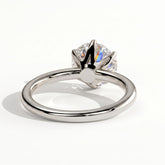 Round lab-grown diamond solitaire engagement ring in 950 platinum, on white background 