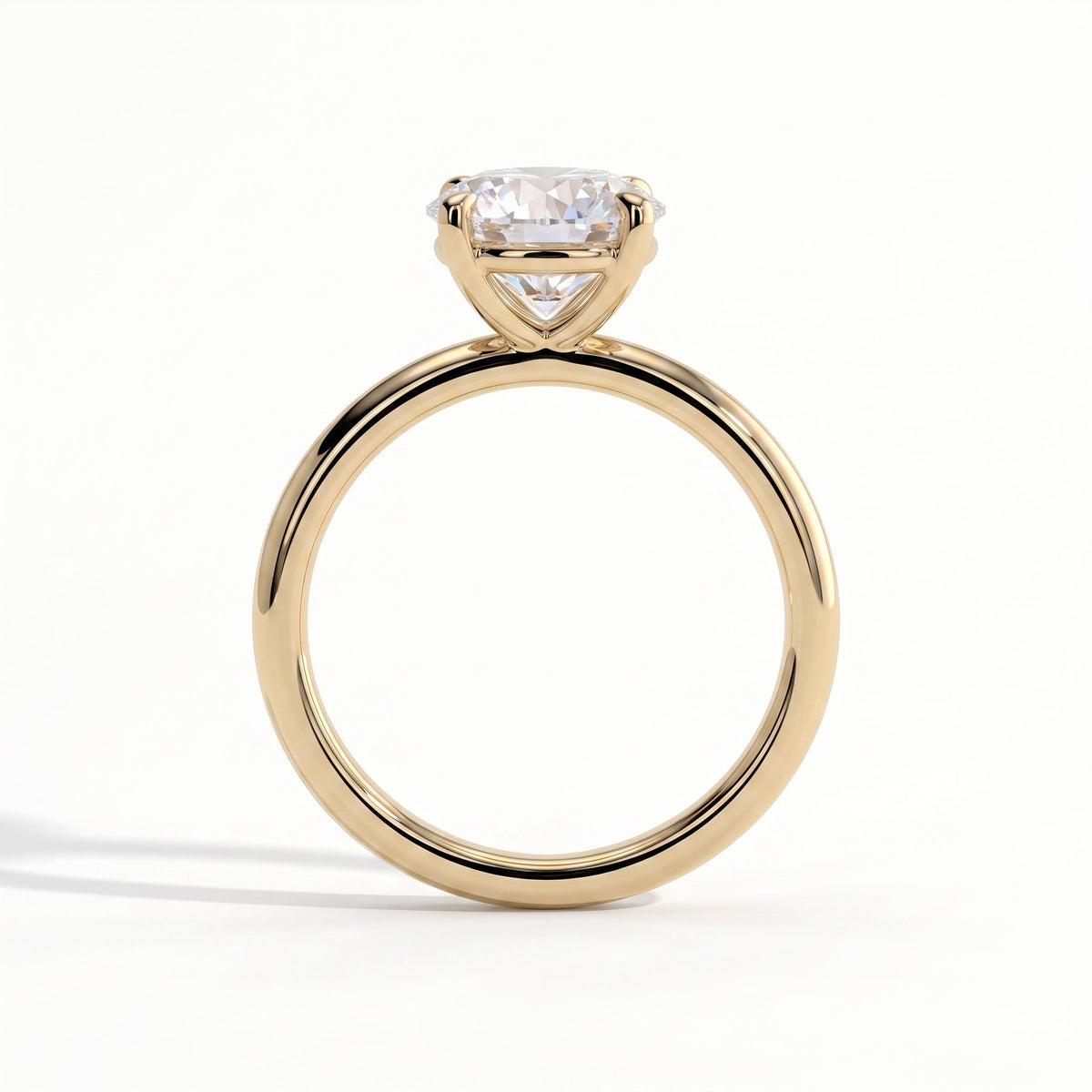 Round lab-grown diamond halo engagement ring in 14K (585) yellow gold, side profile 