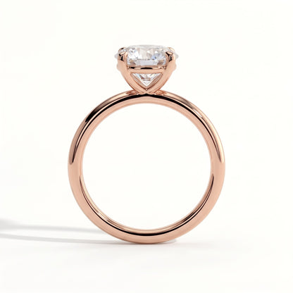 Round lab-grown diamond halo engagement ring in 14K (585) rose gold, side profile 