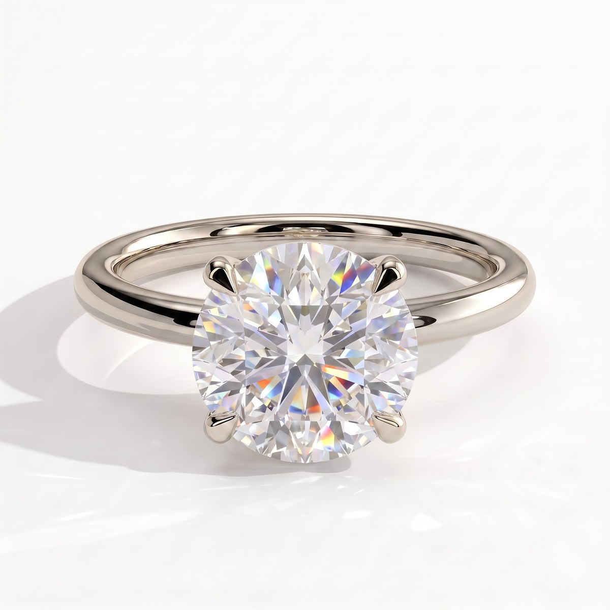 Round lab-grown diamond halo engagement ring in 14K (585) white gold, front view 