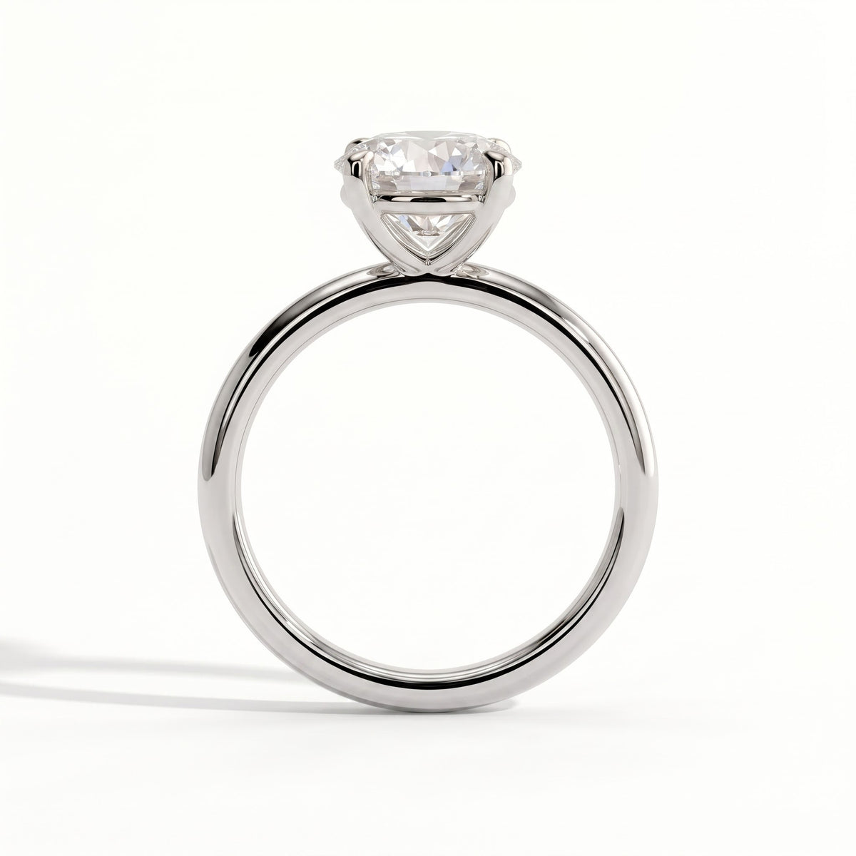 Round lab-grown diamond halo engagement ring in 18K (750) white gold, side profile 