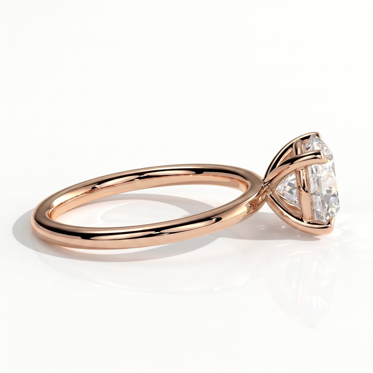 Round lab-grown diamond halo engagement ring in 18K (750) rose gold, detail view 
