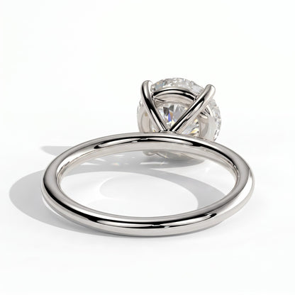 Round lab-grown diamond halo engagement ring in 18K (750) white gold, on white background 