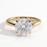 Round lab-grown diamond halo engagement ring in 18K (750) yellow gold, front view 