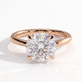 Round lab-grown diamond halo engagement ring in 18K (750) rose gold, front view 