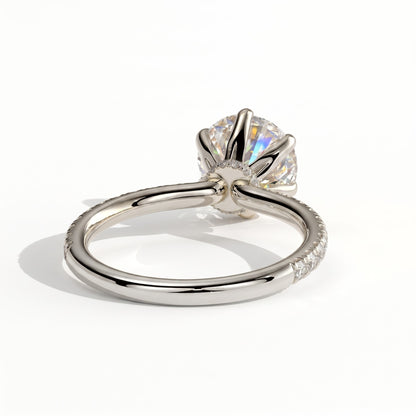 Round lab-grown diamond halo engagement ring in 14K (585) white gold, on white background 