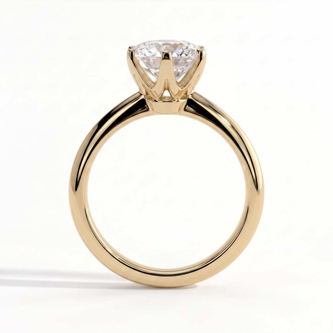 Round lab-grown diamond solitaire engagement ring in 14K (585) yellow gold, side profile 