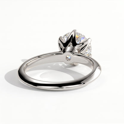 Round lab-grown diamond solitaire engagement ring in 14K (585) white gold, on white background 