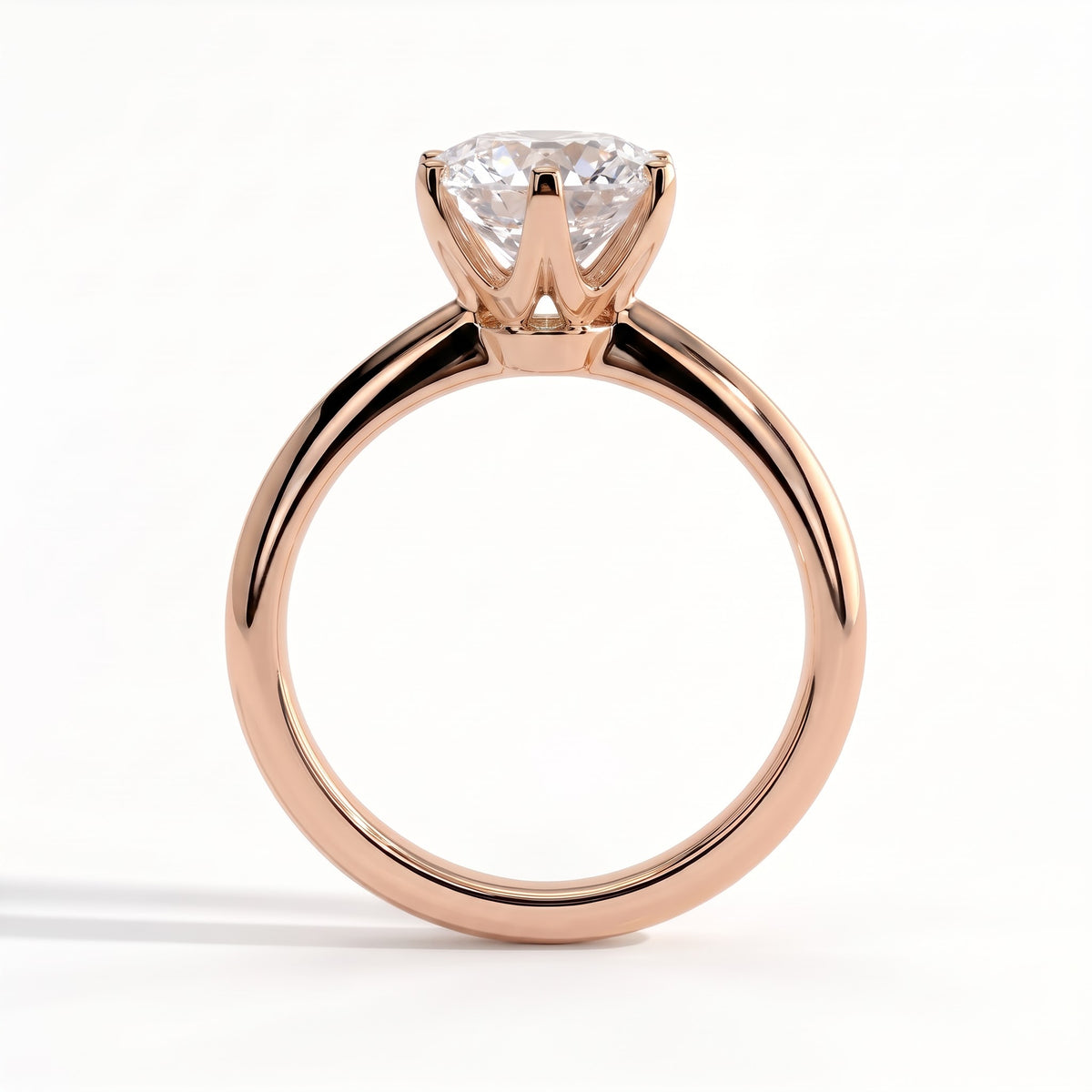 Round lab-grown diamond solitaire engagement ring in 14K (585) rose gold, side profile 