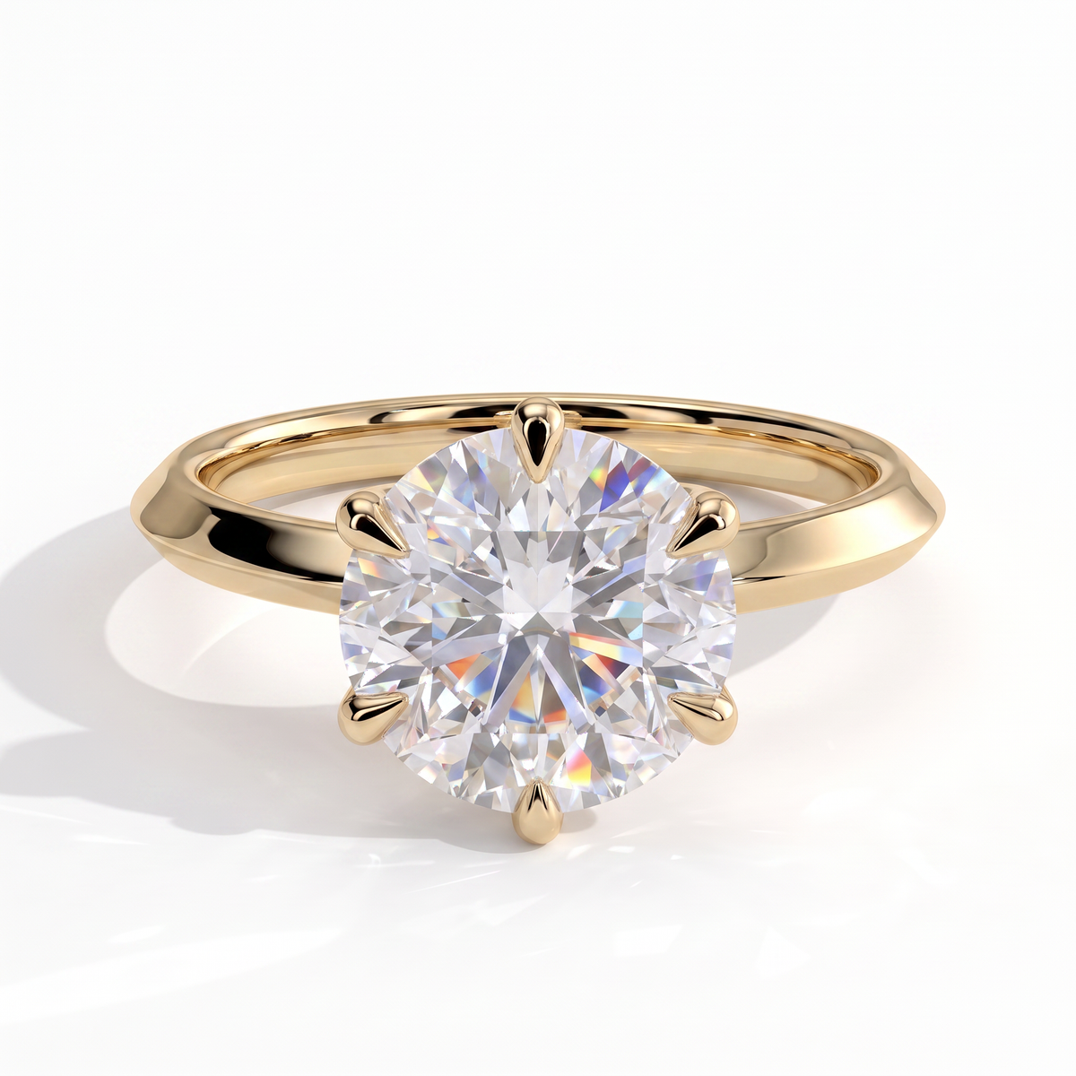 Round lab-grown diamond solitaire engagement ring in 18K (750) yellow gold, front view 