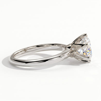 Round lab-grown diamond solitaire engagement ring in 950 platinum, on white background 