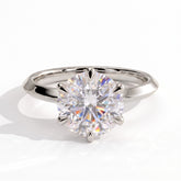 Round lab-grown diamond solitaire engagement ring in 950 platinum, front view 