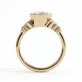 Round lab-grown diamond bezel-set halo engagement ring in 14K (585) yellow gold, side profile 
