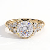 Round lab-grown diamond bezel-set halo engagement ring in 14K (585) yellow gold, front view 
