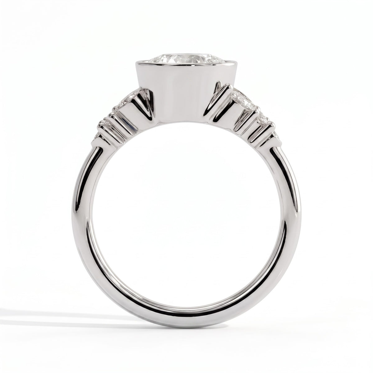 Round lab-grown diamond bezel-set halo engagement ring in 950 platinum, side profile 