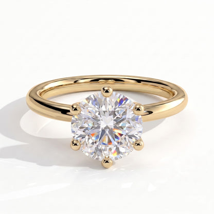 Round lab-grown diamond solitaire engagement ring in 14K (585) yellow gold, front view 