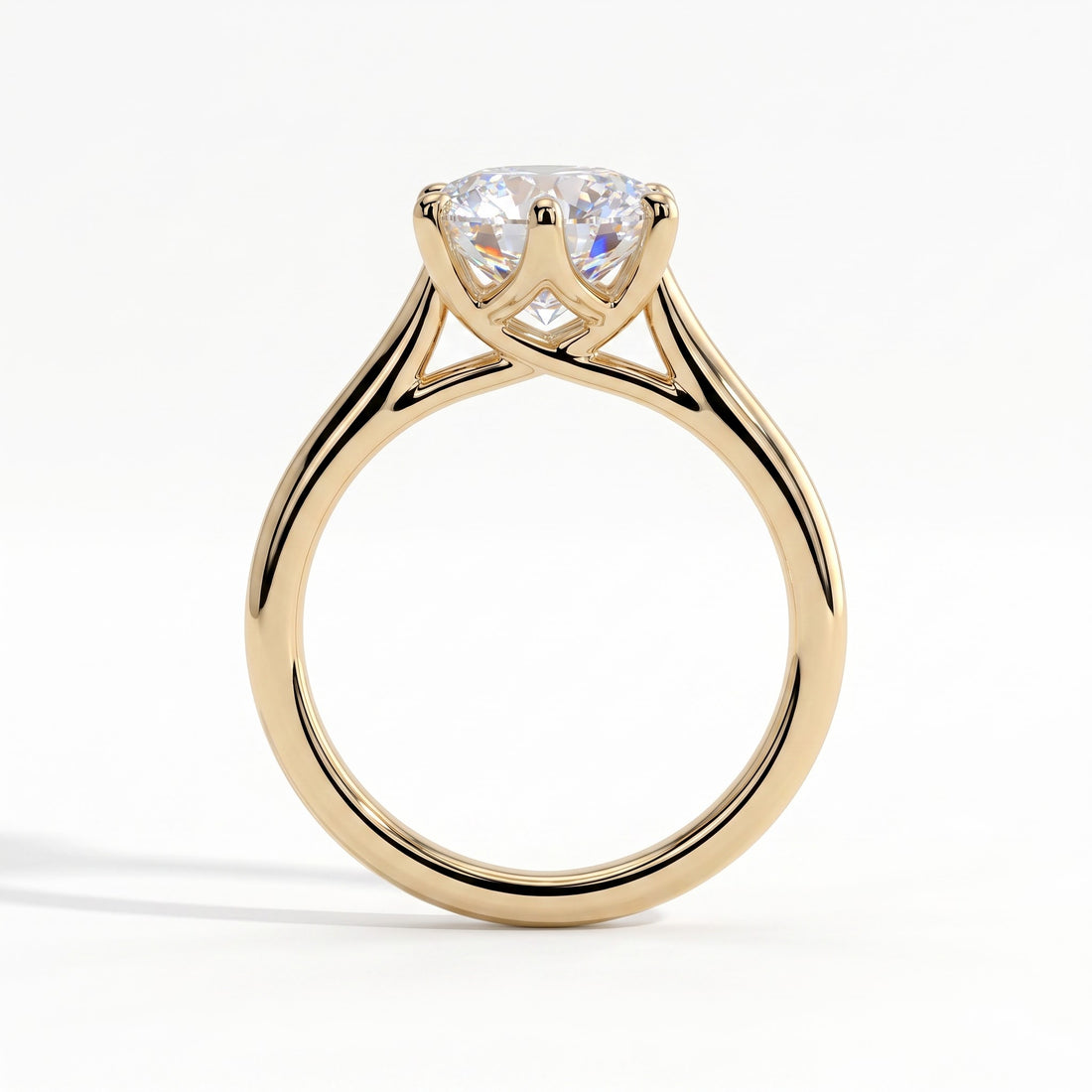 Round lab-grown diamond solitaire engagement ring in 14K (585) yellow gold, side profile 