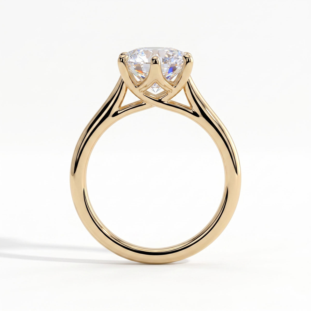 Round lab-grown diamond solitaire engagement ring in 14K (585) yellow gold, side profile 