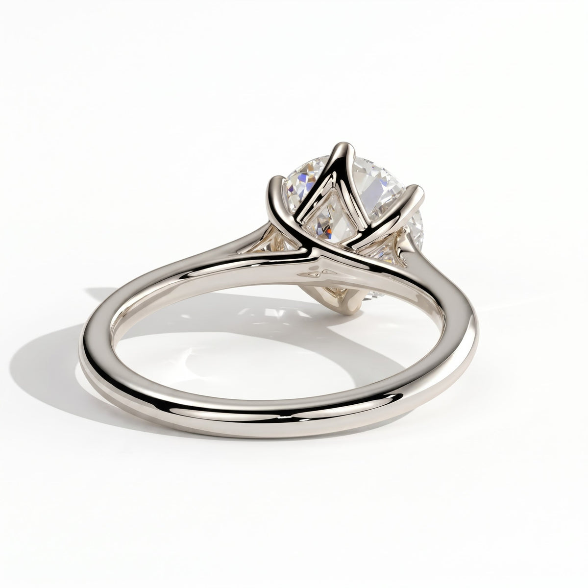 Round lab-grown diamond solitaire engagement ring in 14K (585) white gold, on white background 