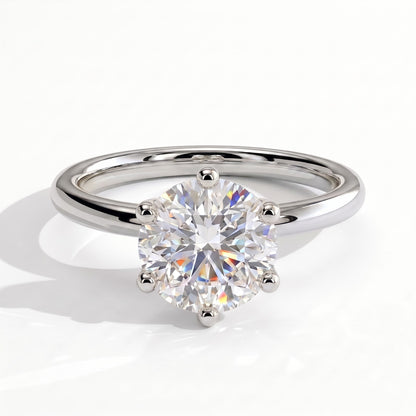 Round lab-grown diamond solitaire engagement ring in 950 platinum, front view 