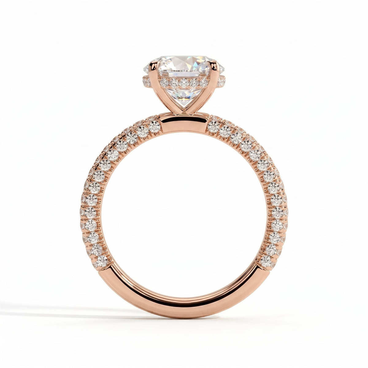 Round lab-grown diamond halo engagement ring in 14K (585) rose gold, side profile 