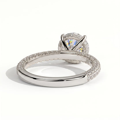 Round lab-grown diamond halo engagement ring in 18K (750) white gold, on white background 