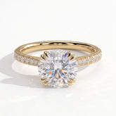 Round lab-grown diamond halo engagement ring in 14K (585) yellow gold, front view 