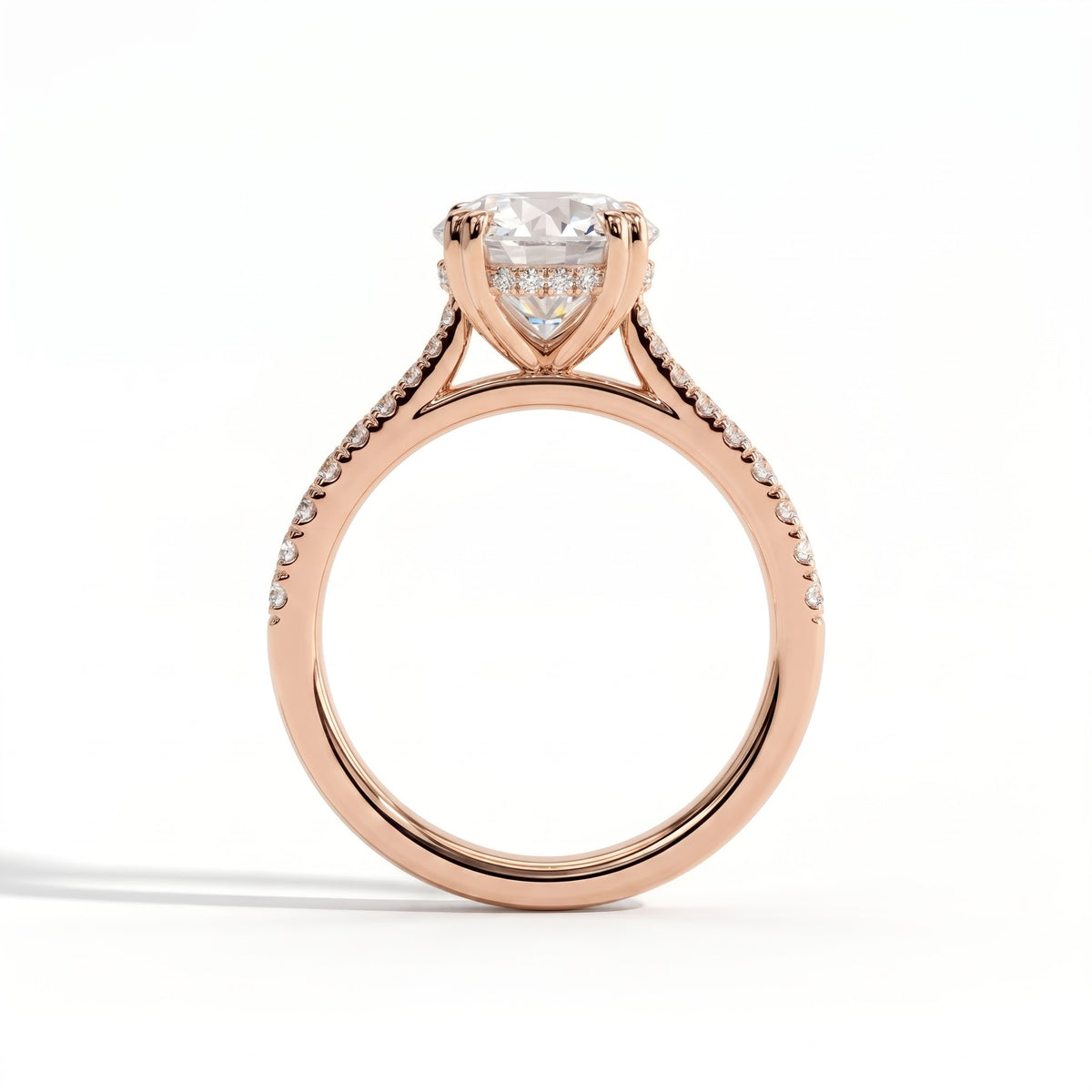 Round lab-grown diamond halo engagement ring in 14K (585) rose gold, side profile 