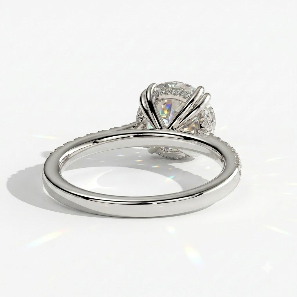 Round lab-grown diamond halo engagement ring in 950 platinum, on white background 