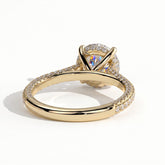 Round lab-grown diamond halo engagement ring in 18K (750) yellow gold, on white background 